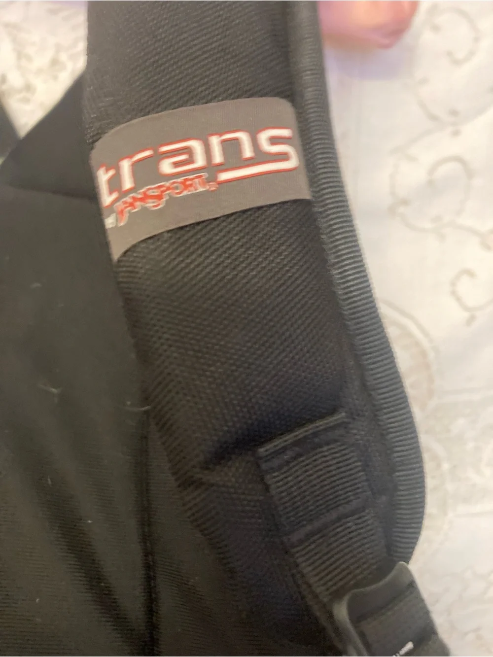 TRANS by JANSPORT Checkerboard With Daisies Charm Loaded Backpack